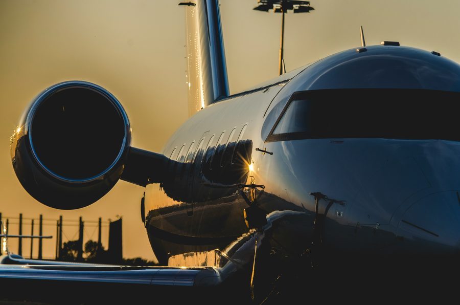 Private jet on the runway at golden hour